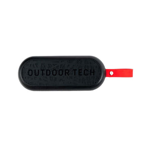 Outdoor Tech black portable speaker with red strap
