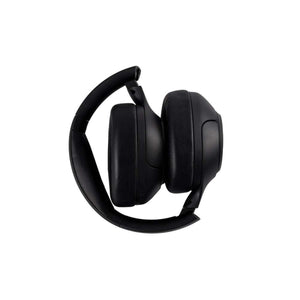 Black over ear wireless headphones folded for storage