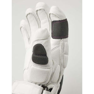 Hestra white leather ski glove with black protective padding on fingers and palm