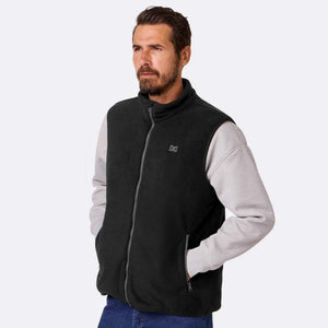 Man wearing a black Mobile Warming fleece vest over a grey long sleeve shirt