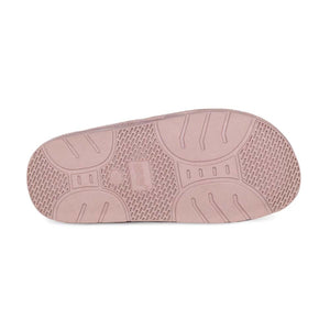 Pink Cloud Nine Sheepskin slipper sole with textured tread pattern