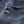 Blue FjallRaven ribbed knit sweater with wooden buttons