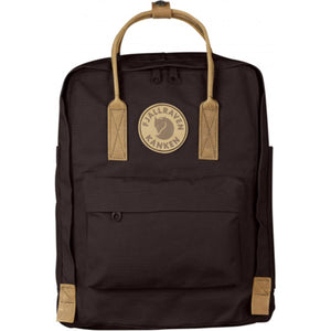 Fjallraven Kanken backpack in dark brown with tan leather handles and logo patch