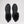 Pair of black quilted ankle boots with front zipper closure viewed from above