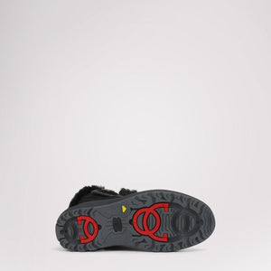 Pajar boot sole with red traction cleats and black tread pattern