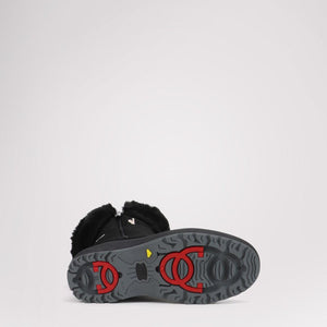 Pajar black winter boot with red and grey traction sole