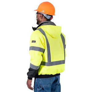 Worker wearing a Pioneer high visibility yellow hooded jacket with reflective stripes and an orange hard hat