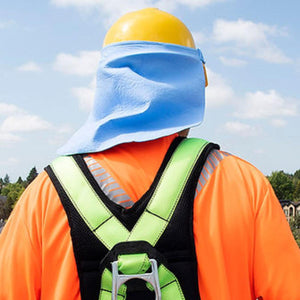 Worker wearing a yellow hard hat with a blue neck shade and a high visibility orange shirt with a safety harness