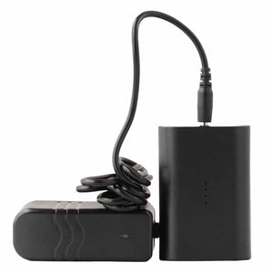 Black battery pack connected to a power adapter by a coiled cable