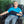Man sitting in a chair wearing a Polar Products cold therapy wrap on his forearm