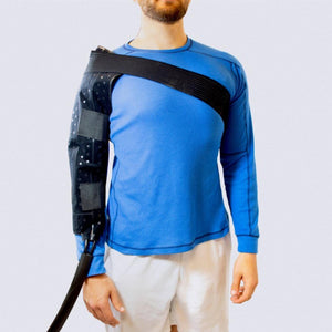 Polar Products shoulder cooling wrap worn on right arm over blue long sleeve shirt