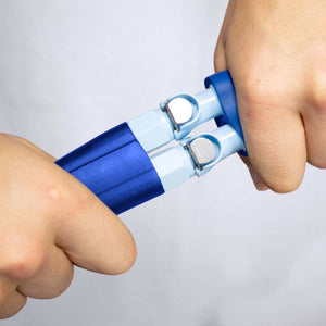 Hands squeezing a blue and white Polar Products hand exerciser