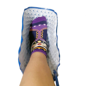 Polar Products foot cooling wrap around a foot wearing a patterned sock