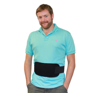 Man wearing a black lumbar support belt over a light blue polo shirt