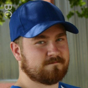 Person wearing a blue Polar Products baseball cap
