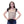 Woman wearing a tan tactical vest over a black shirt