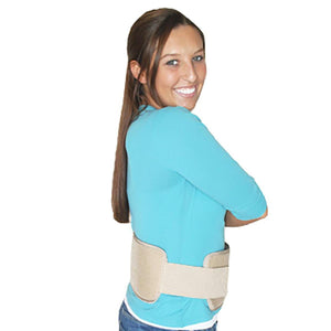 Woman wearing a beige Polar Products back support wrap