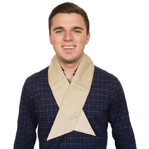 Man wearing a beige Polar Products cooling neck wrap over a navy plaid shirt