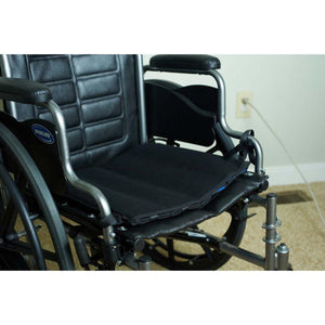 Polar Products black cooling seat cushion on an Invacare wheelchair