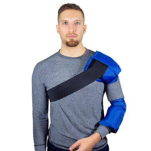 Man wearing a blue gel ice pack wrap on his left shoulder and upper arm