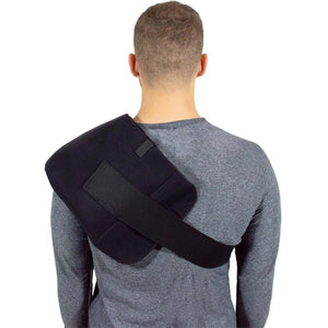 Person wearing a black shoulder support brace over a grey long sleeve shirt