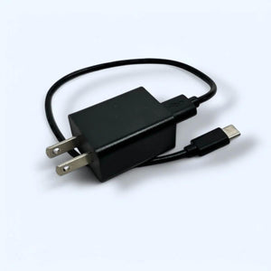 Polar Quest Shop black USB wall charger with attached cable