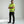 Man wearing a Polar Quest high visibility yellow cooling vest with integrated fans and reflective strips