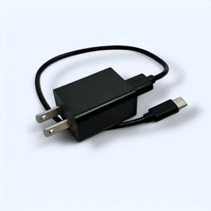 Polar Quest black wall charger with attached USB-C cable