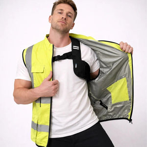 Man wearing a Polar Quest high visibility yellow safety vest over a white t-shirt