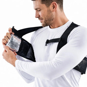 Man inserting a Polar Quest cooling pack into a shoulder strap pocket