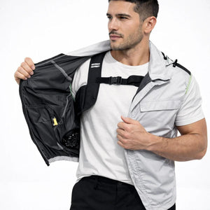 Man wearing a Polar Quest light grey short sleeve jacket with an integrated cooling fan inside