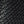 Close up of K1 Ice Cleats tread pattern with repeating logo texture