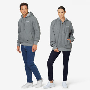 Man and woman wearing grey Venture Heat zip up hoodies with jeans and white sneakers