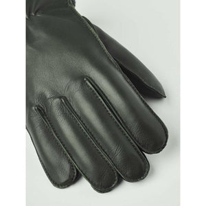 Dark green leather glove with stitched finger details