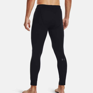 Back view of Under Armour black compression leggings on a person