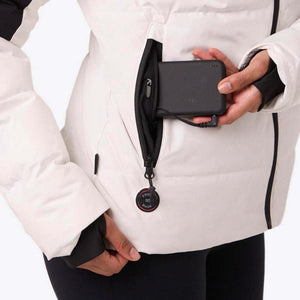 Mobile Warming jacket battery pack being inserted into side pocket