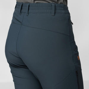 Back view of dark blue Fjallraven trekking trousers with elastic waistband and belt loops