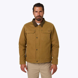 Man wearing a tan Mobile Warming canvas jacket with a dark green collar and two chest pockets