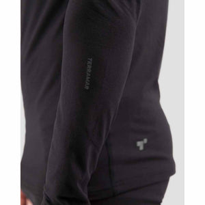 Close up of black Terramar long sleeve base layer showing brand logo on arm