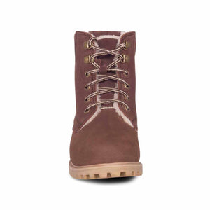 Brown leather lace up boot with faux fur lining and thick rubber sole