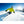 Skier wearing Dr Warm gloves and gear on a sunny snowy slope