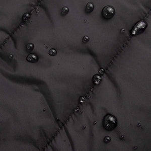 Water droplets beading on black Radians fabric