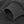 Close up of a dark grey fleece jacket sleeve with a ribbed cuff