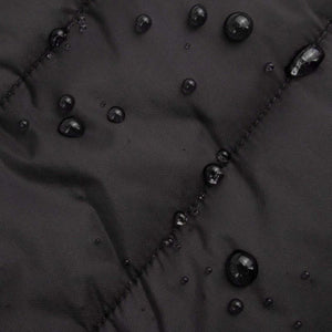 Water droplets beading on black Radians fabric