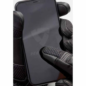 REVIT motorcycle glove finger touching a smartphone screen