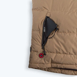 Mobile Warming tan vest with battery pack in zippered pocket and power button