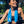 Woman wearing a blue Alphacool cooling towel around her neck outdoors