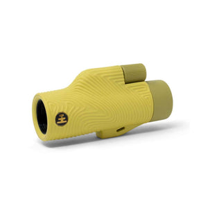 Olive green handheld monocular with textured grip and focus dial