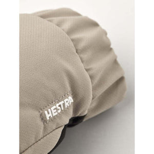 Close up of beige Hestra mitten cuff with elastic detail