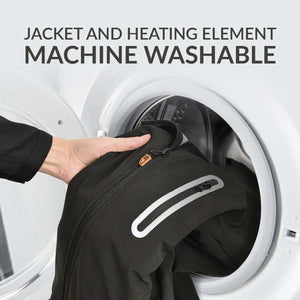 Hand placing a 30seven jacket into a washing machine